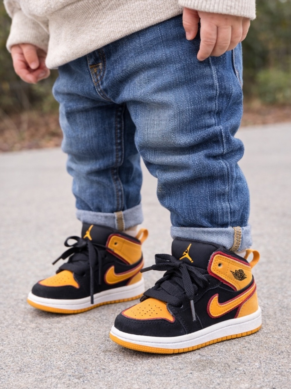 Jordan Kids Black and Orange High-Top Sneakers